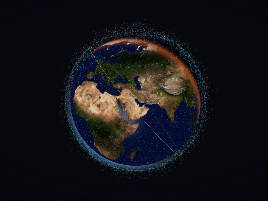 Globe 3D de la Terre entourée de points colorés représentant satellites actifs et débris en orbite
